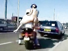 Smoking Hot Chick Gets Completely Naked And Rides A Motorcycle