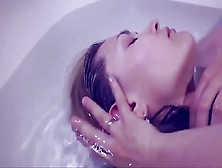 Sensual Sounds Are Produced While A Babe Washes Her Hair In The Bath