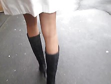 Black Boots And Tan Stockings Upskirt