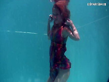 Red-Head Baby Nikita Vodorezova Gets Naked Fast Underwater