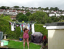 Sam Hangs Out The Washing