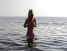 Divine Blonde Teen Blissfully Naked In The Sea