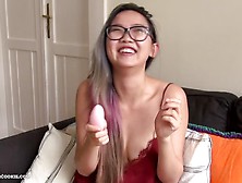 Asian Teen Playing With Her Toys